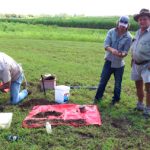 Max McFarlane provides a case study into a hardwood trial Reef Catchments Chris Dench and Peter Muller with cane grower Max McFarlane examining soils at the farm forestry site at Bloomsbury.