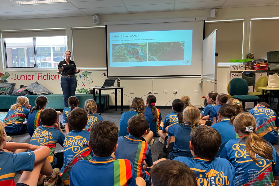 Reef Catchments staff presenting to students at Mirani School